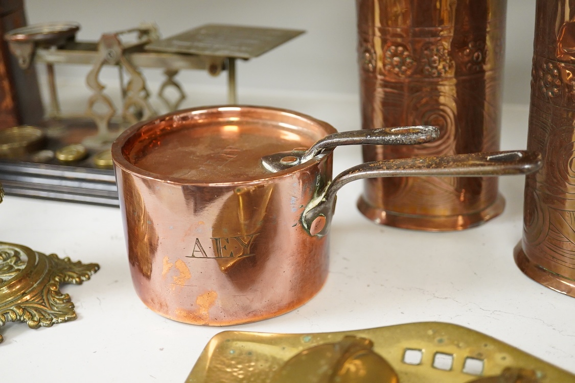 A collection of items to include a leather cased gilt brass French carriage clock, a German bronze Jugendstil inkwell, a late 19th century ink brass inkwell, a set of postal scales with weights, a Temple & Crook small co